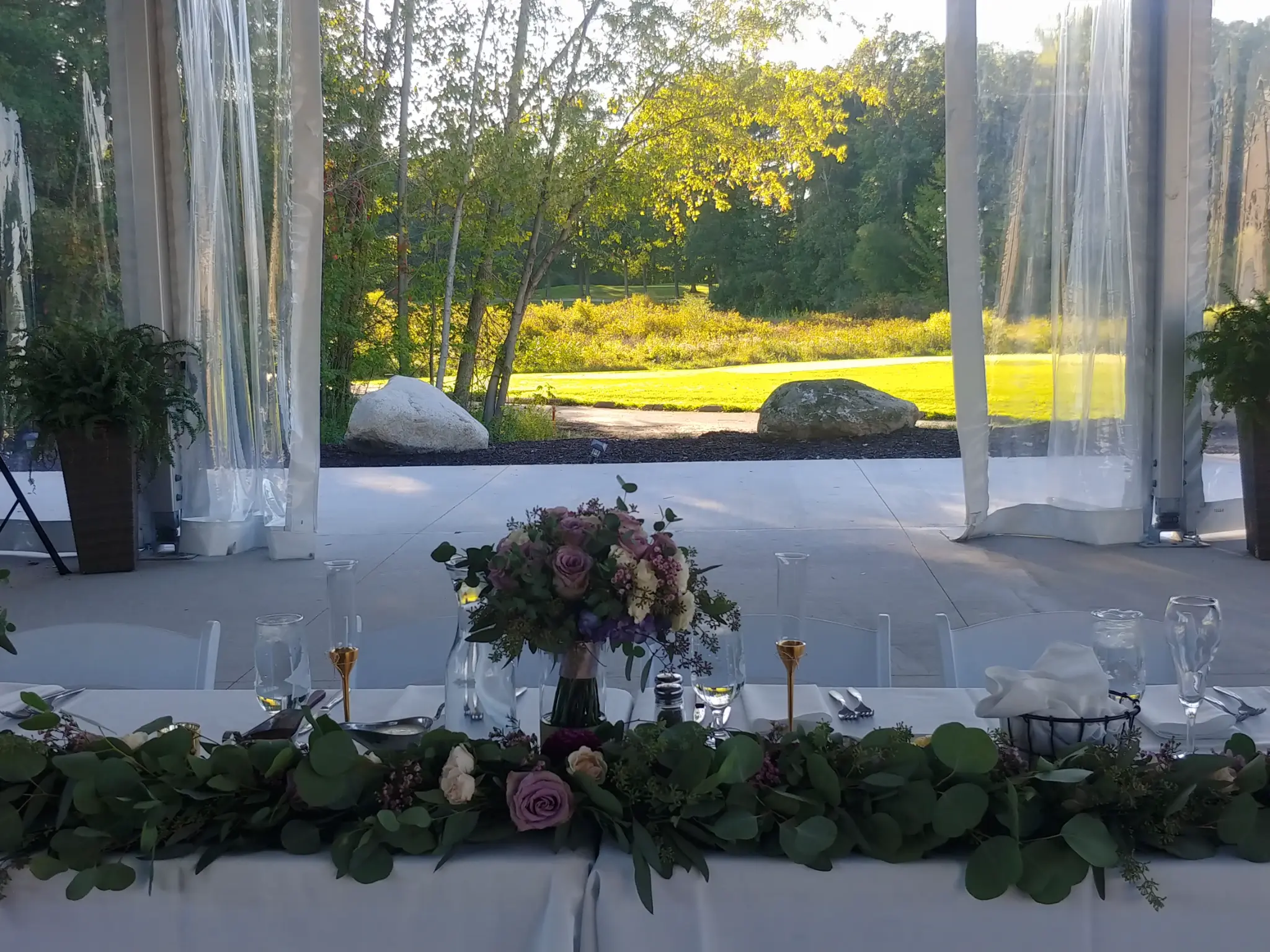 Exterior view of the wedding reception tent at Quail Ridge Golf Club